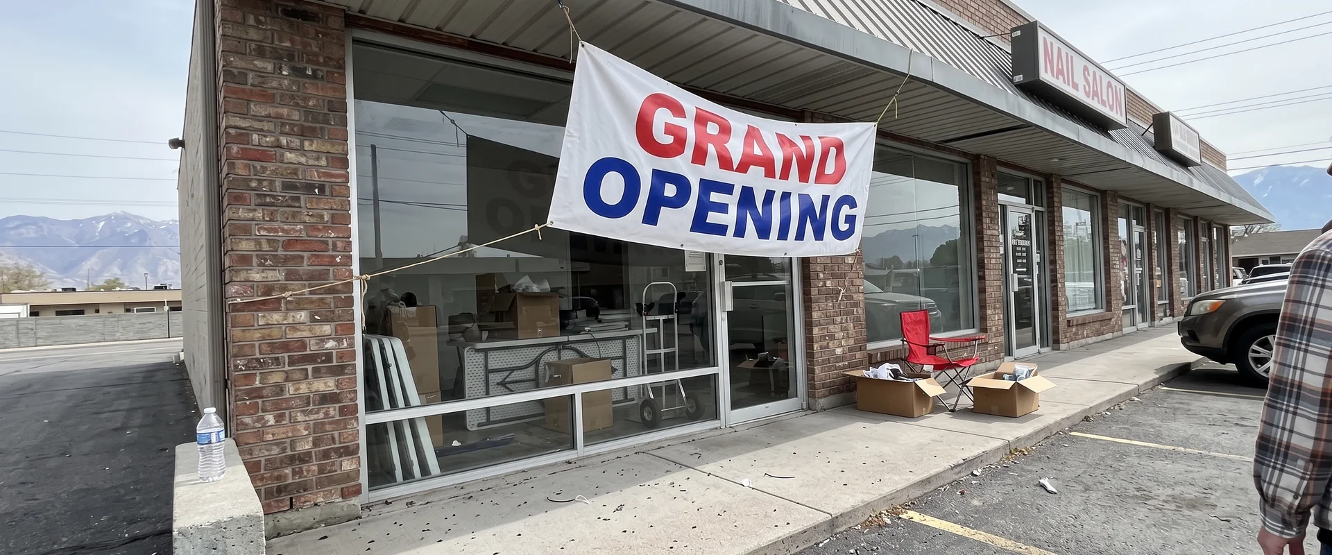 Vinyl banner across a small storefront