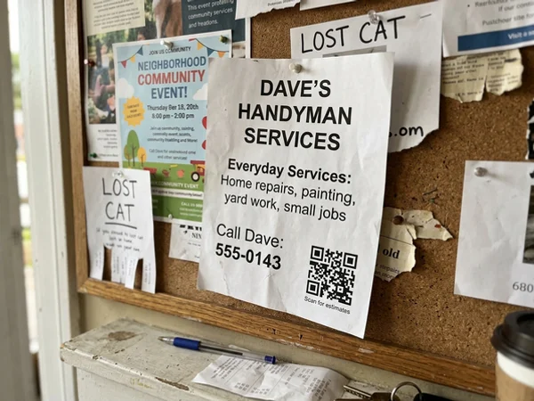 Close view of a board ad with a QR code