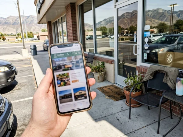 Mobile-friendly local business website on a phone