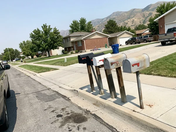 Suburban street with curbside mailboxes