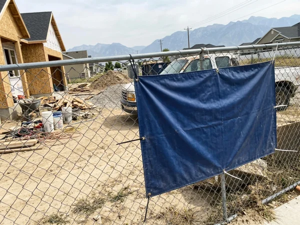 Banner on a job-site fence